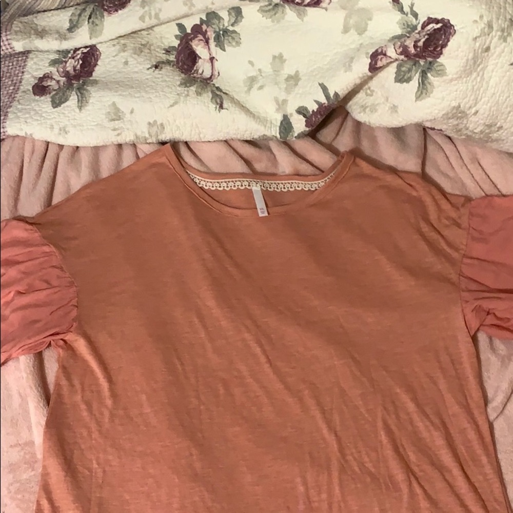 Cute peach shirt with eyelet sleeves